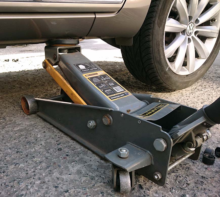 floor jack under the car