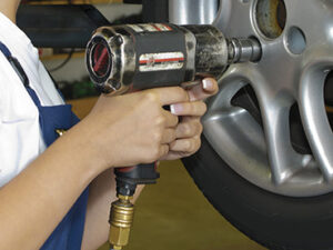 Power impact wrench in use