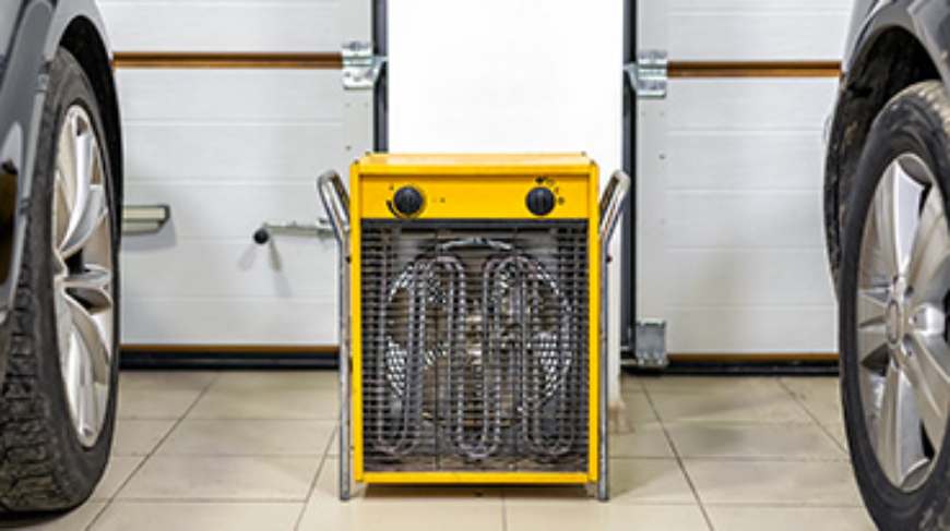Big electric fan heater in double-car garage