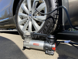 Portable tire inflator