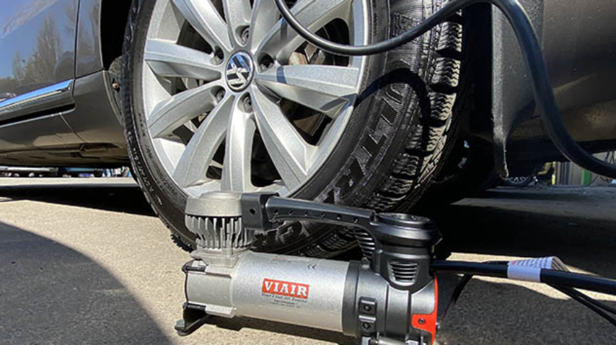 Portable tire inflator